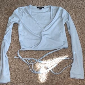 Blue long sleeve cross body crop top